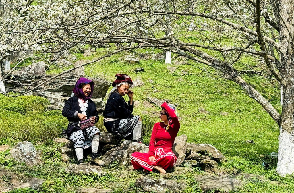 Visitors share moments of tranquility with local people.